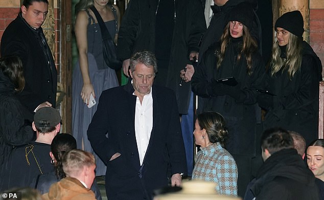 Hugh and Anna were seen milling amongst the crowds as they headed off after the show