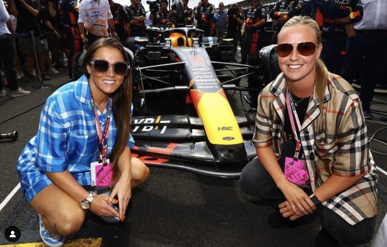Kirby attends an F1 race with pal and teammate Beth Mead