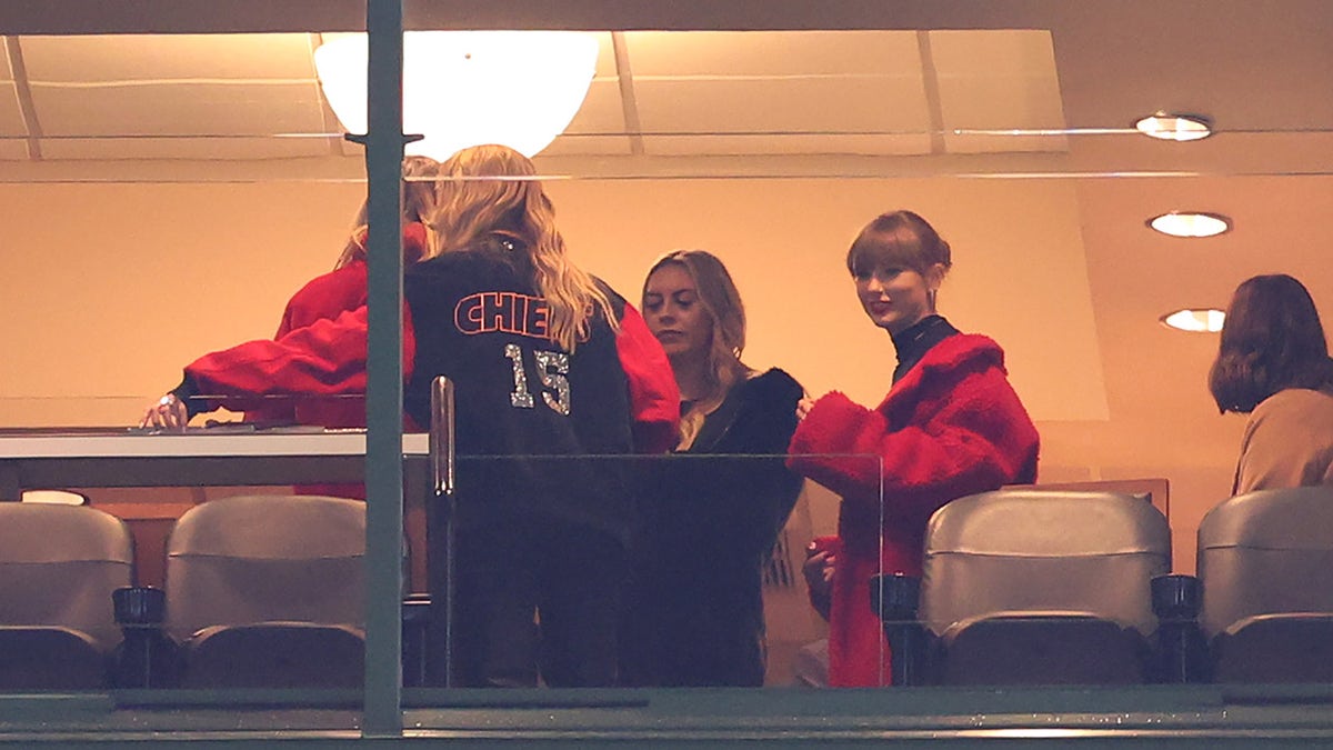 Taylor Swift smiles from Green Bay Packers game for Travis Kelce