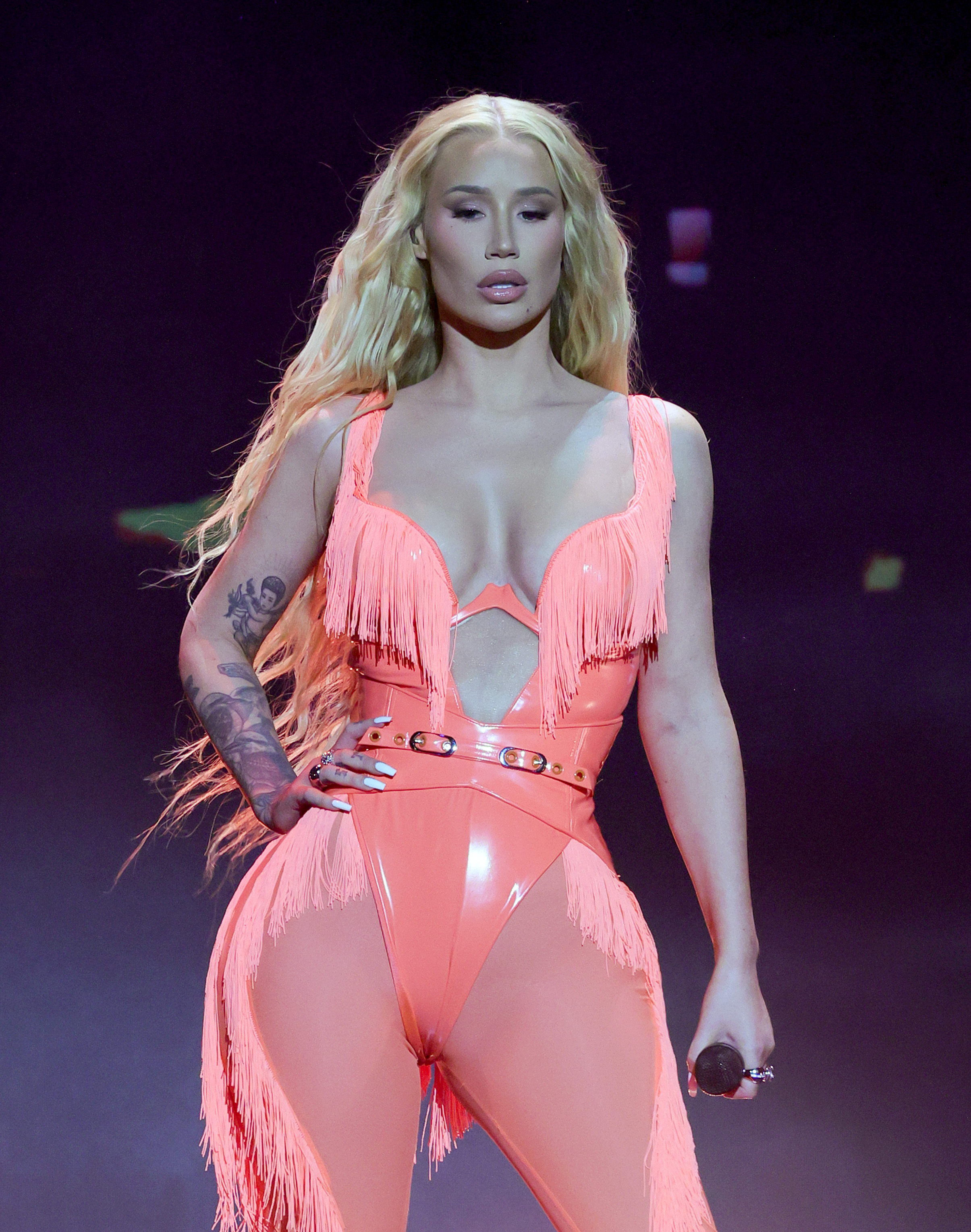Iggy Azalea dumped Young after reviewing CCTV footage at their home and discovering he was cheating